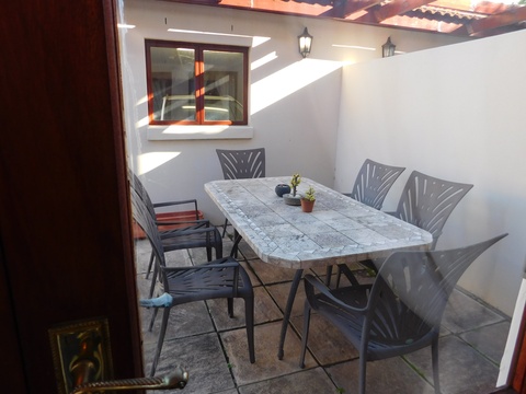 Outside seating area of Olivedale - Self Catering Accommodation Fish Hoek